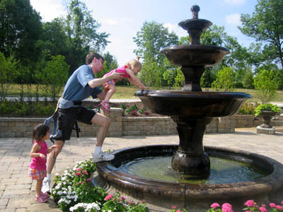 One of the best parts was the fountain, and Daddy picked us up so we could tought the water even in the third pool!